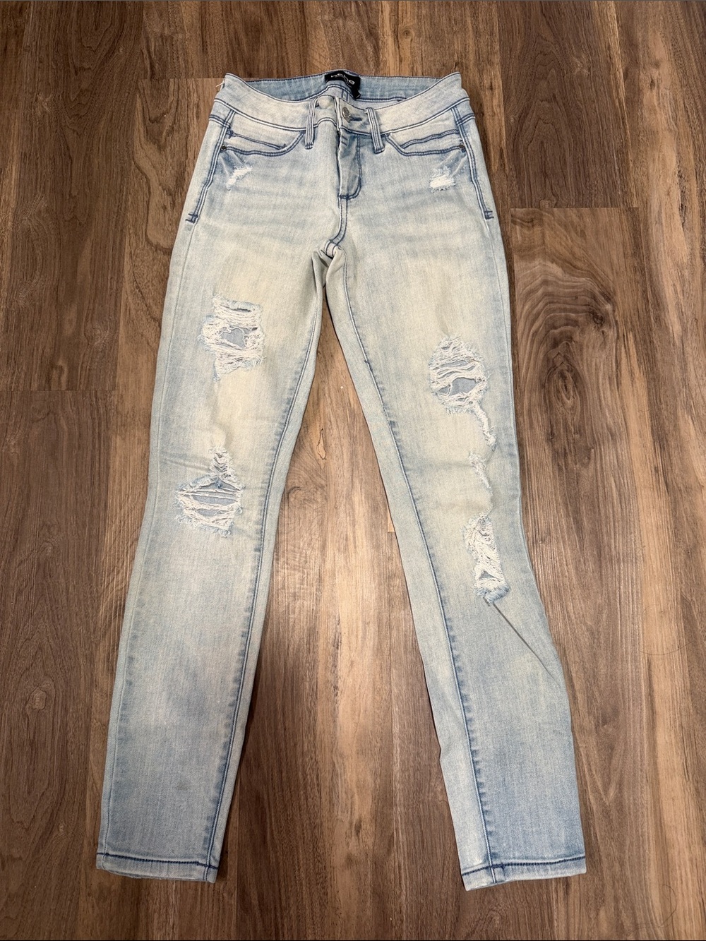 bebe Light Blue Ripped Skinny Jeans cropped